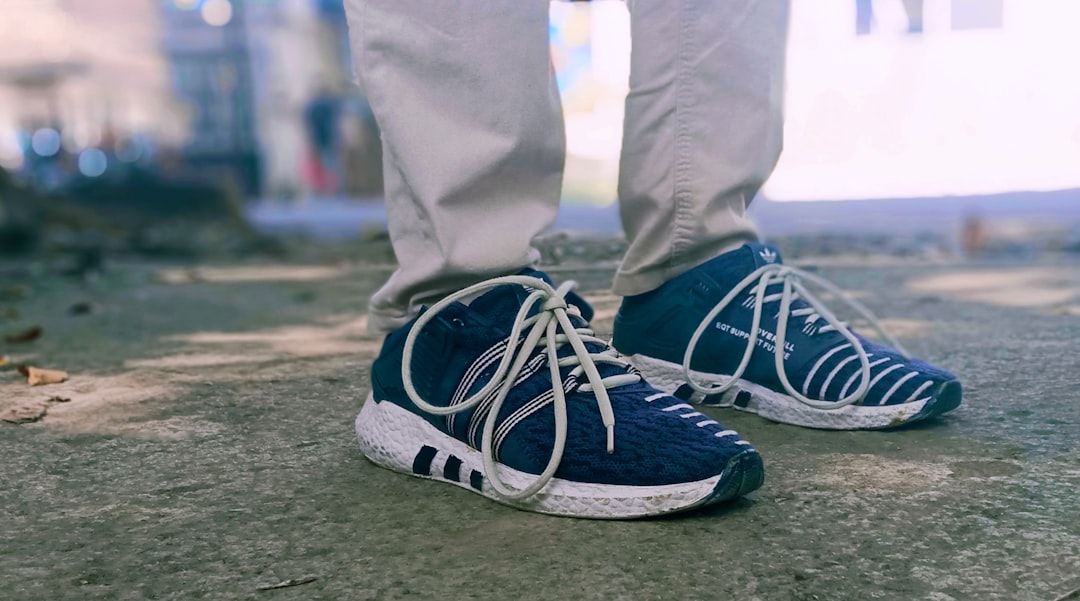 person-in-gray-pants-and-blue-shoes-6o7hf6zz2eg